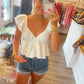 White ruffle crop